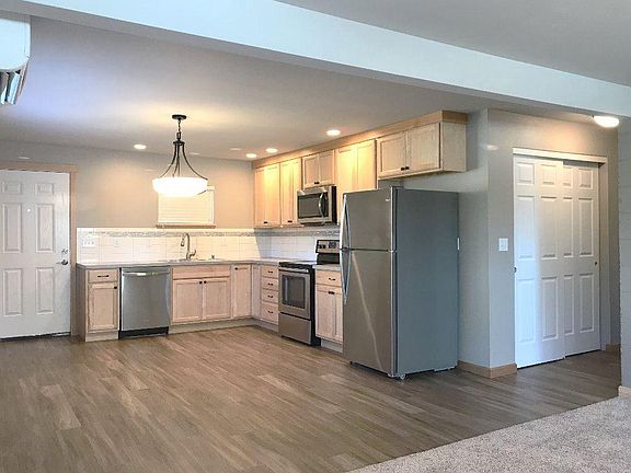 Generous eat in kitchen with a huge pantry around the corner.