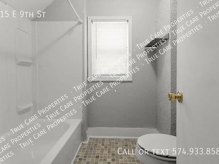 115 E 9th St — Photo 19