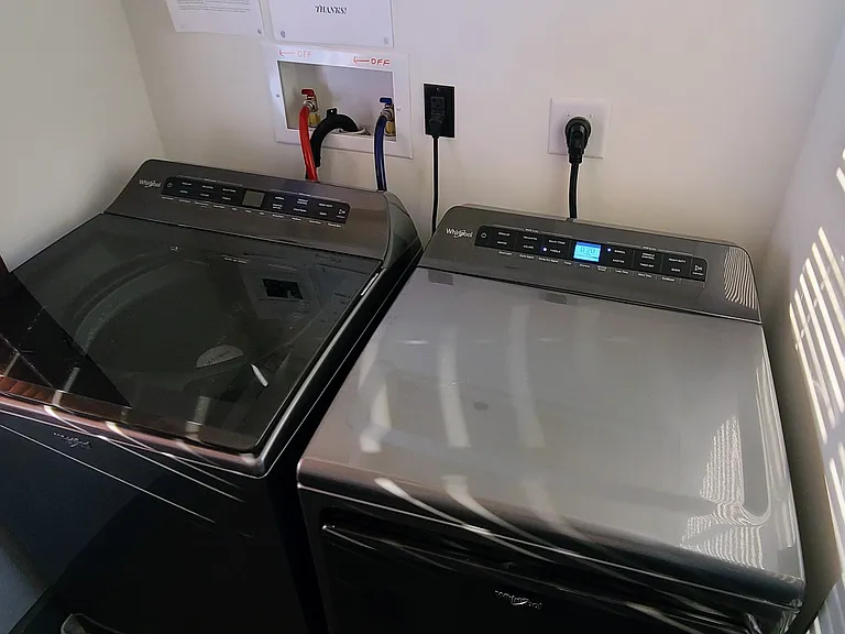 Washing machine and dryer with utility sink
