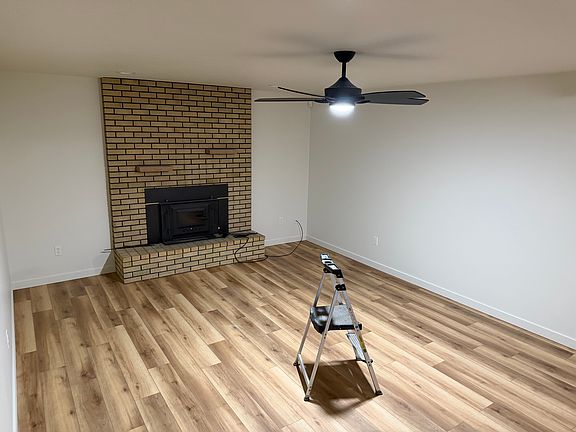 Family room with wood burning fireplace