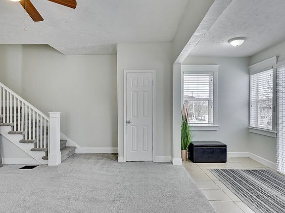 Front entrance and coat closet.