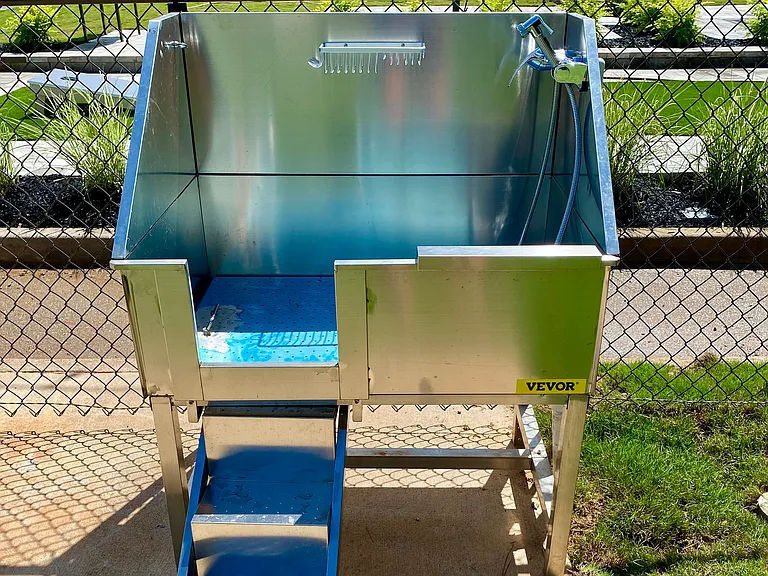 Pamper your furry friends at our convenient on-site dog washing station, professionally operated by Highlands Vista Group.