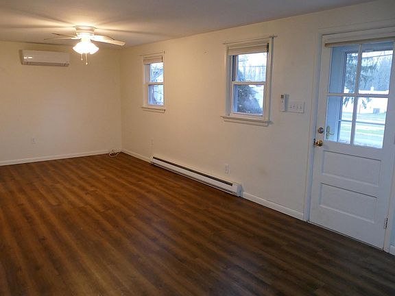 Living room with front door.