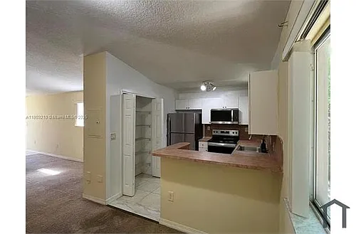 1260 SE 31st Ct #201-34 Photo 1