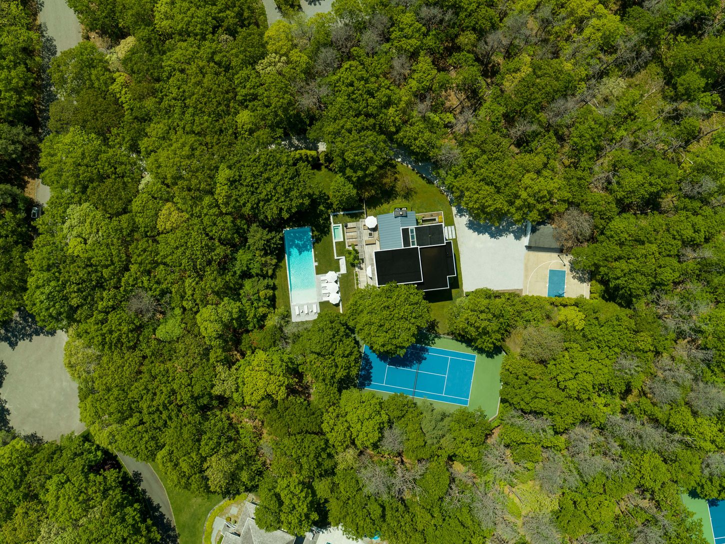  Birdseye View of this stunning Modern with Pool and Tennis on shy 2 acres