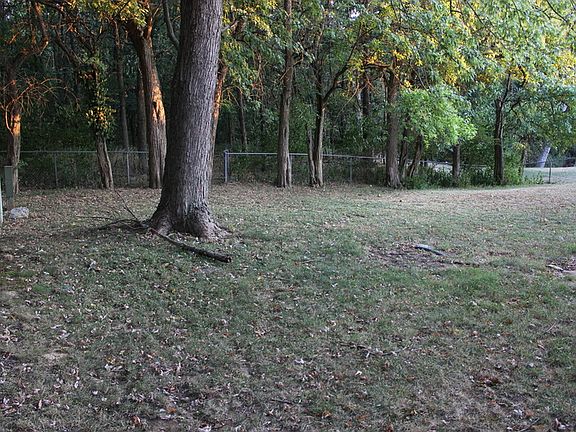 Fenced Back yard
						:
						Backs up to conservation area