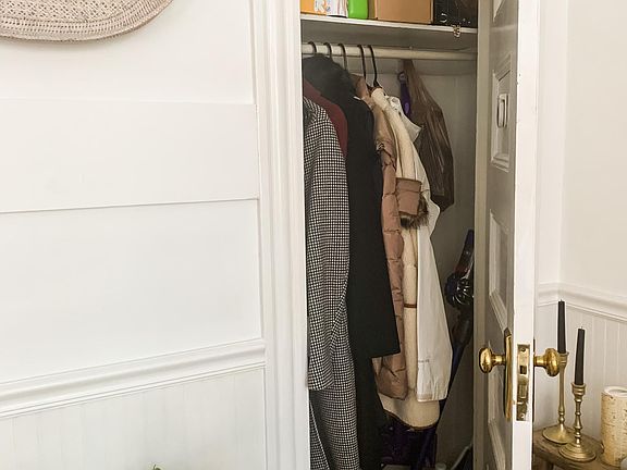 Living room coat closet.