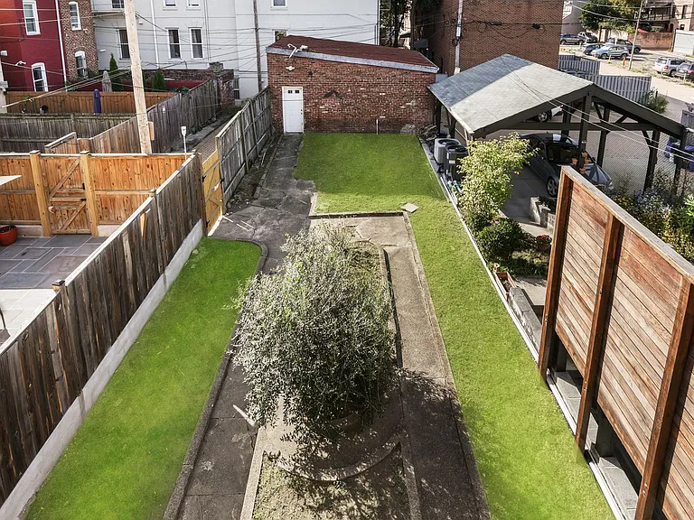 2-car garage, backyardh Olive tree and access to alley