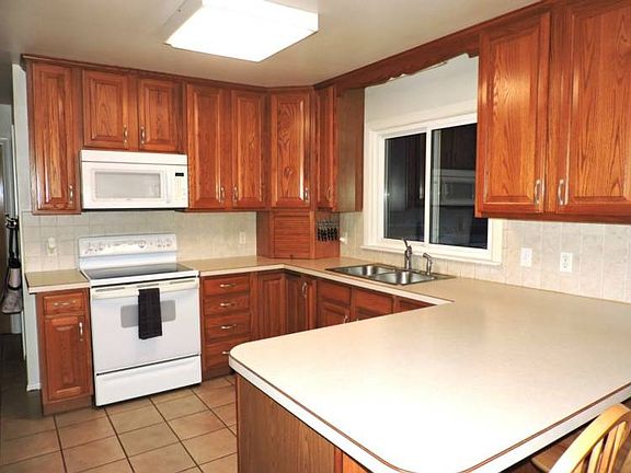 Breakfast bar adds to the counter space.