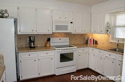 Kitchen! : Tons of storage, updated appliances and an island. Must see!