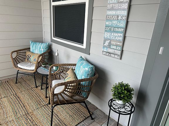 The Porch is a thing grab your wine and RELAX HERE