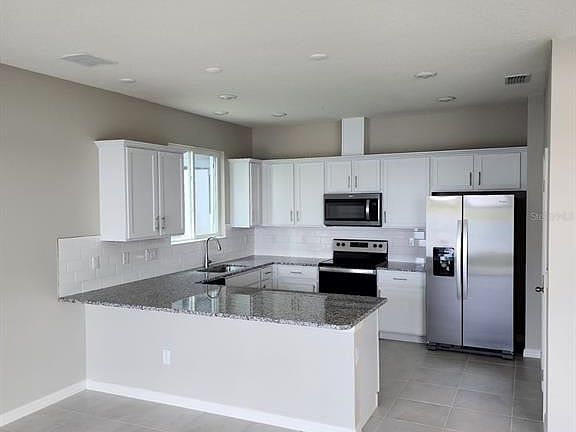 3rd image of 2563 89th Street Cir E
