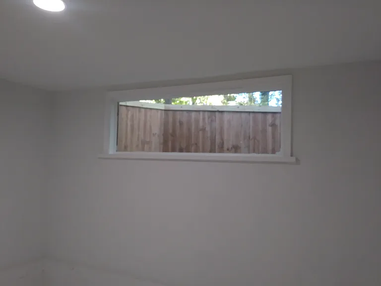 Custom Bedroom window over looking back yard