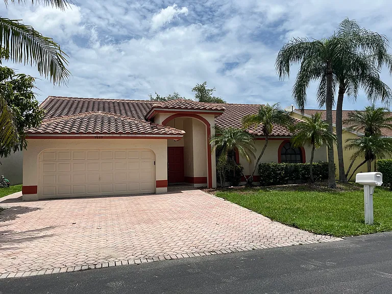 9889 NW 54th Pl — Photo 1