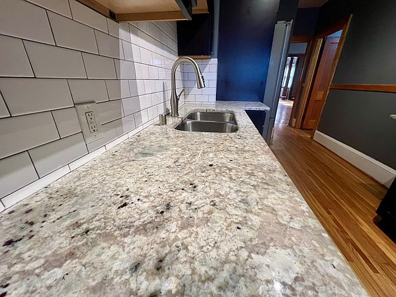 Granite counters and tile backsplash!