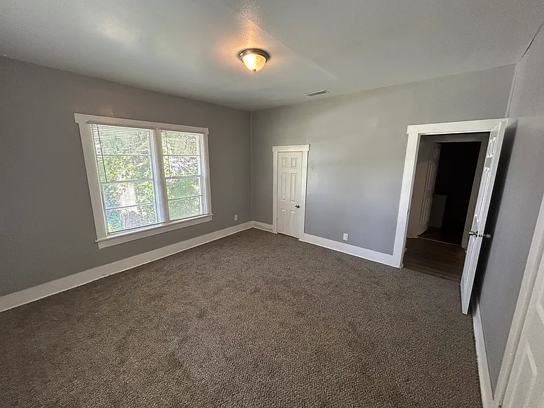 Fresh carpeted bedrooms.