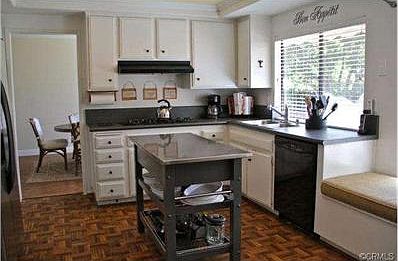 Updated kitchen with a view, center island and window seat!