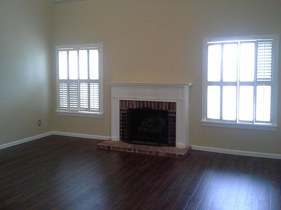 Great Room with large windows and Gas Fireplace