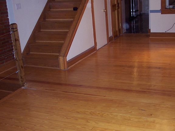 Living Room and Stairs Leading to Bedroom