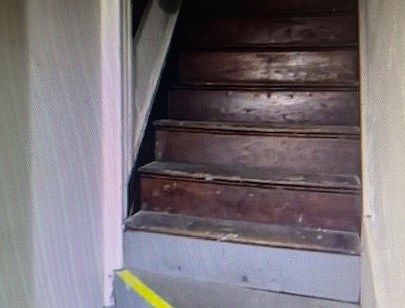 stairs into the upstairs unit