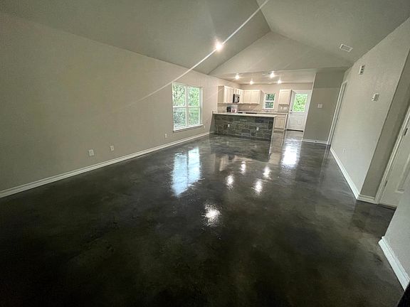 Open Living and Dining with Vaulted Ceiling