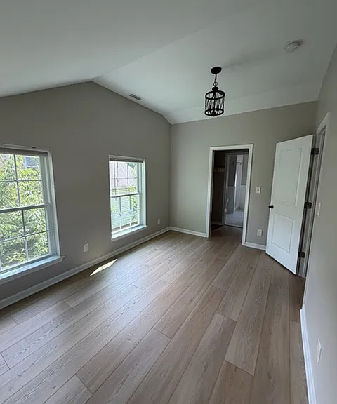 Master bedroom with walk through closet to private bathroom