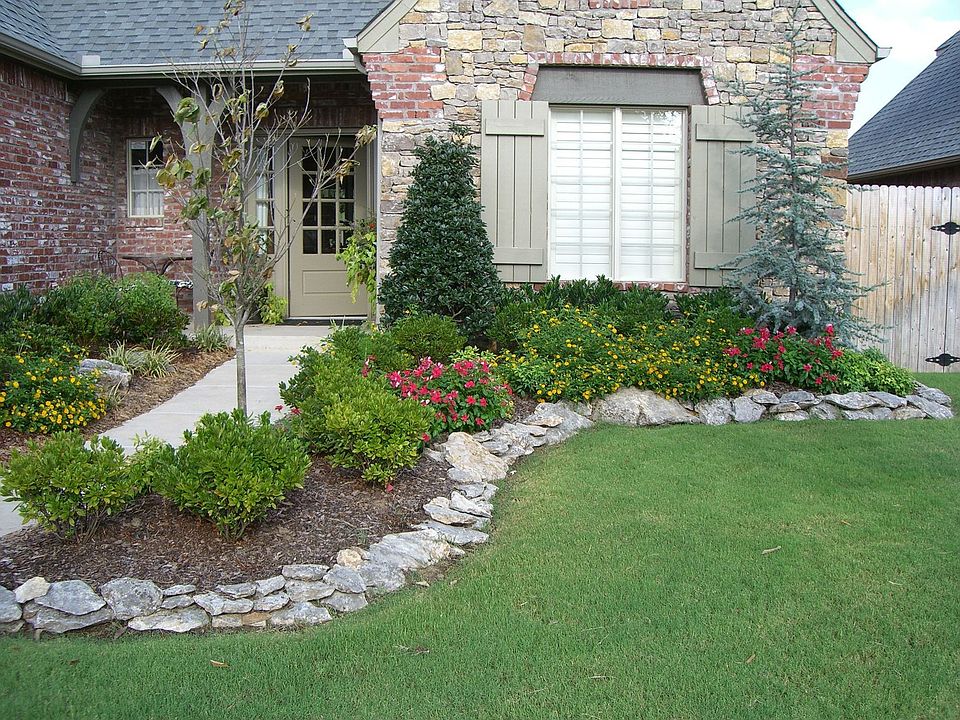 Front Entry with landscaping and lighting