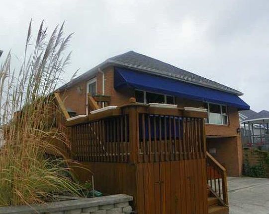 Channel View of Home : The house as viewed from the sidewalk and channel of Indian Lake.