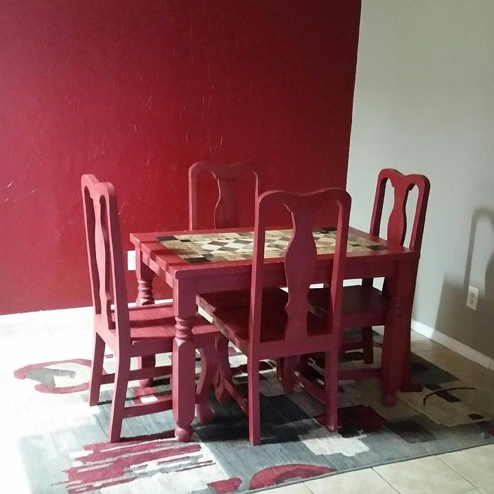 Dining room. Wall is no longer red but same color as wall on right