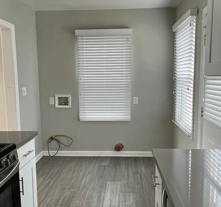 washer and dryer hook ups adjacent to kitchen