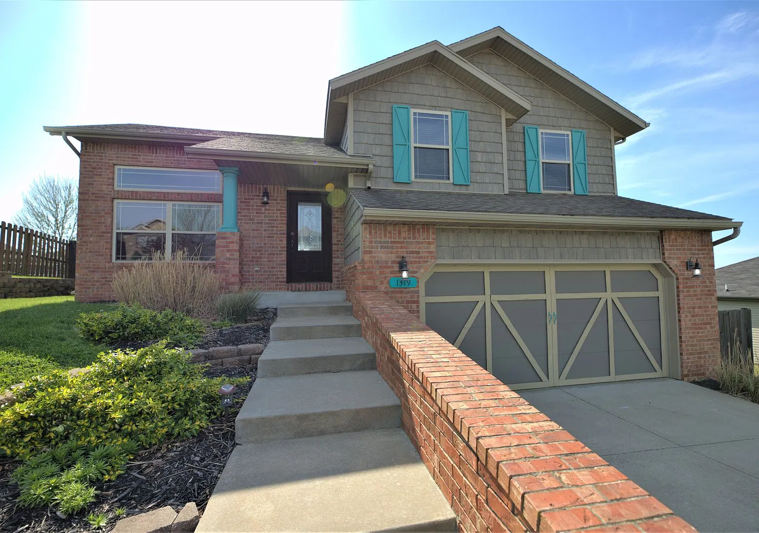 Spacious Ozark Home with Two Living Areas & Fenced Backyard — Photo 1