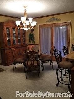 Dining Area
						:
						Dining area with patio doors to the deck