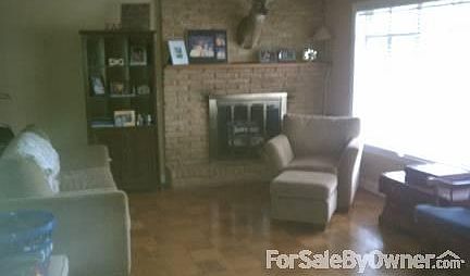 Living Room
						:
						Fireplace with gas logs and Huge Window