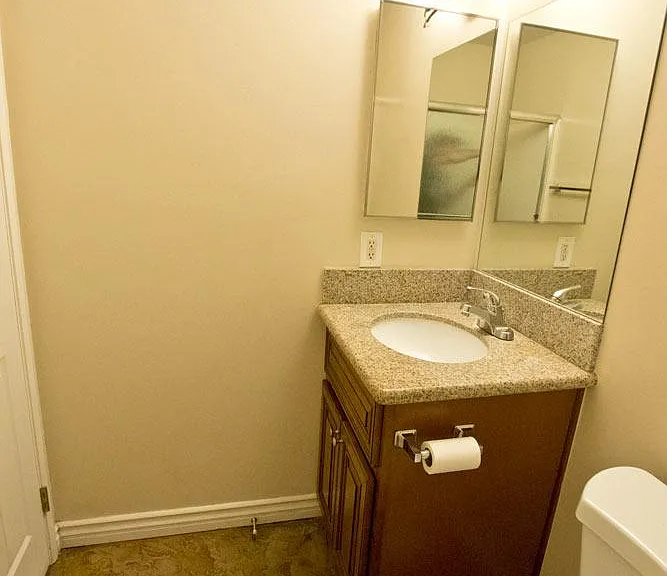 Both hall bathrooms have the same vanities, sinks, medicine cabinets and granite countertops.