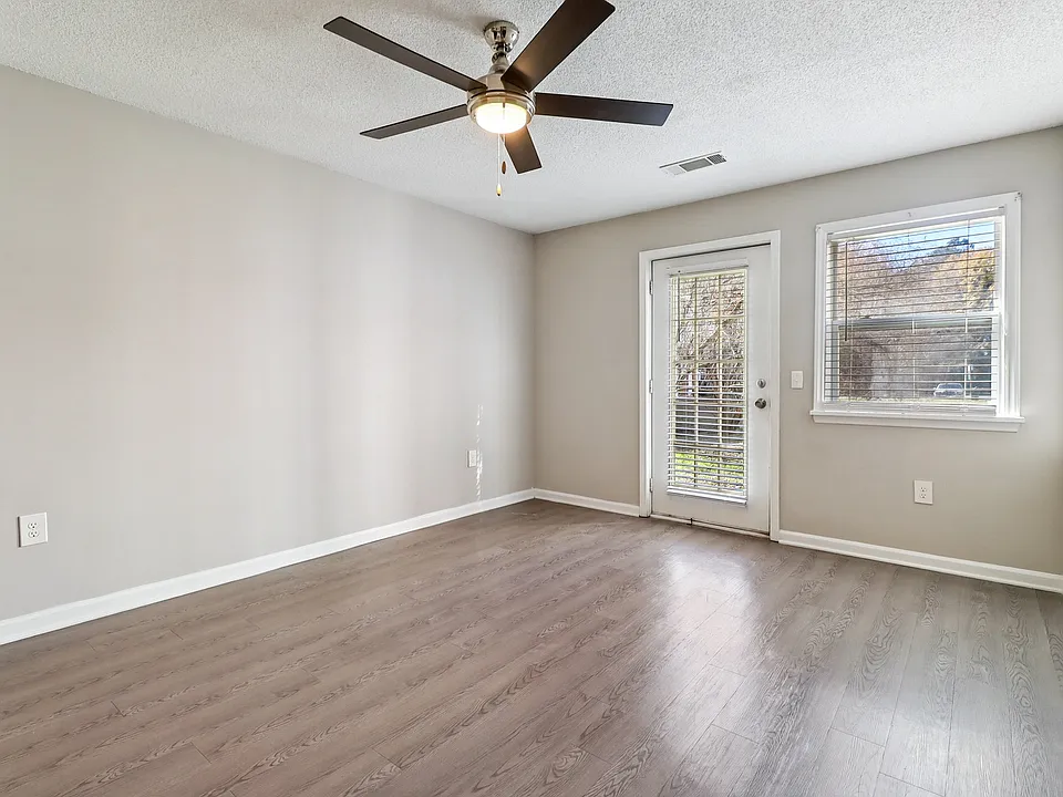 Comfortable spaces feature ceiling fans, hardwood flooring, and direct access to your private balcony, professionally operated by Highlands Vista Group.