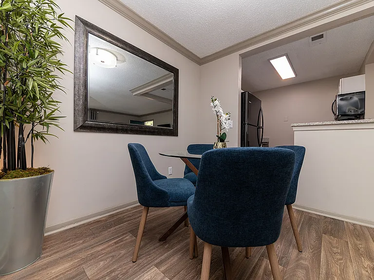 Dining area with hardwood-style flooring