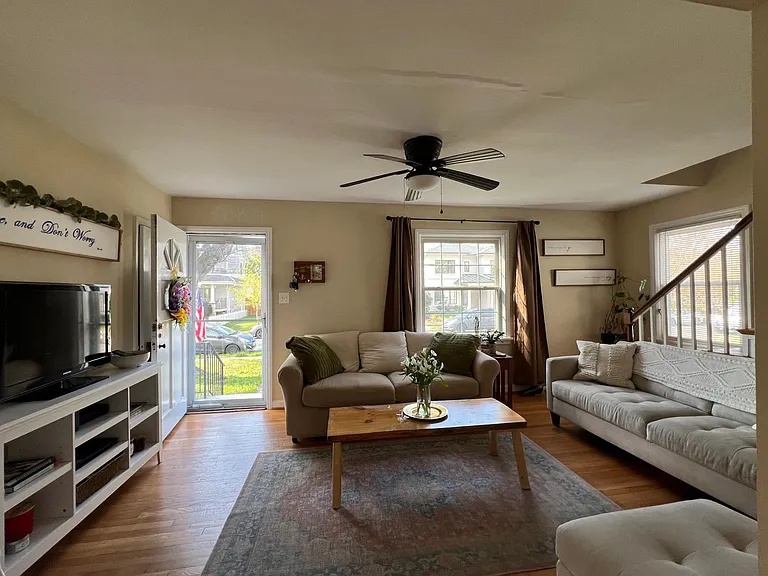 Living Room and Staircase Leading to Upper Bedrooms