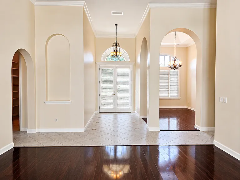 Gorgeous entryway with Chandelier and Arches