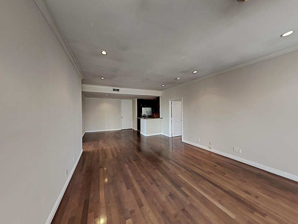 Living and dining area with recessed lights