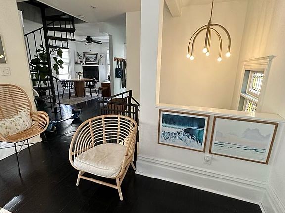 From living room, looking towards dining area and spiral staircase.