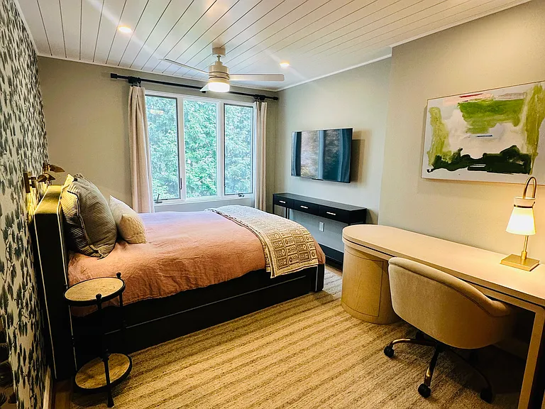 Back bedroom with queen bed with trundle and big screen TV