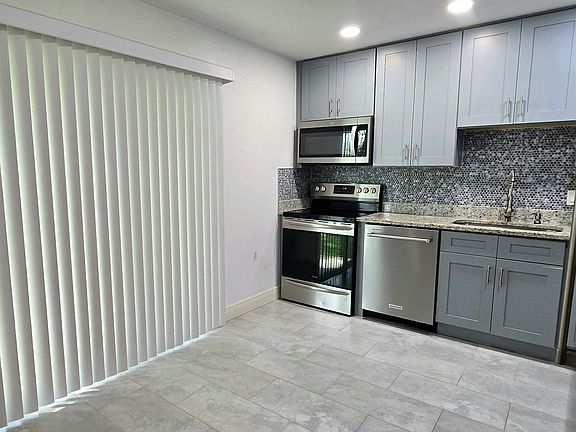 Kitchen/Sliding door to fenced backyard