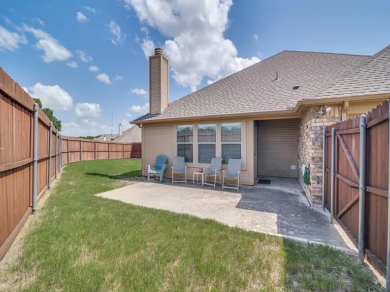 Large and fenced backyard w lots of space for pets or children.