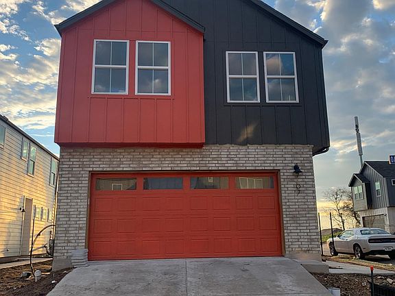 Two full car garage and wide driveway can fit two SUVs