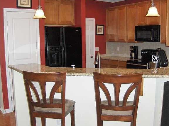 Another view of the kitchen from the spacious family room.