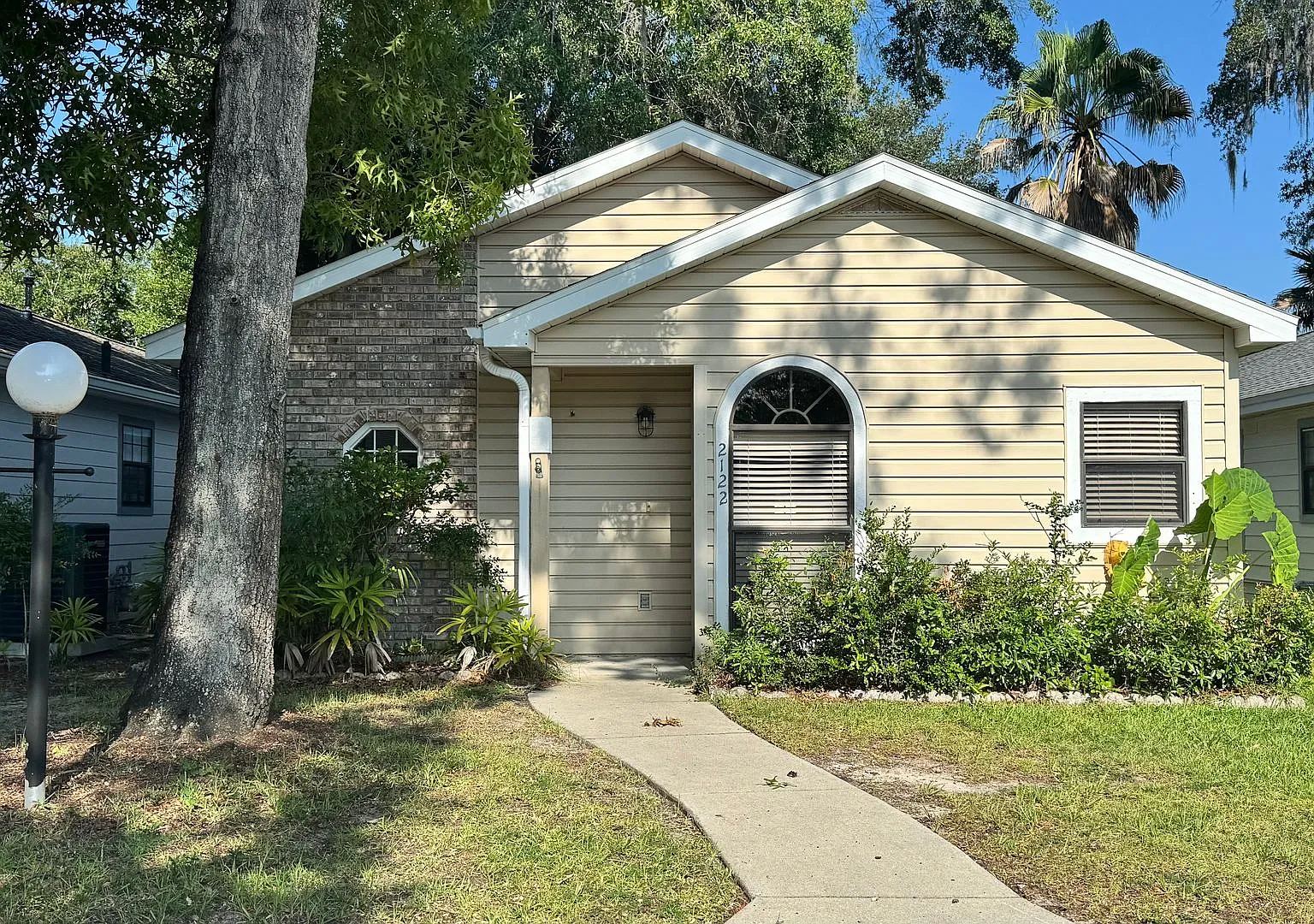 Spacious 2BR/2BA Home with Screened Porch & Fenced Yard For Rent! — Photo 1