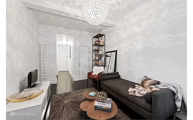 Sold by Douglas Elliman | media 18