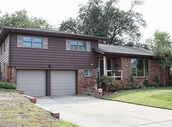 Split level home on treed lot.