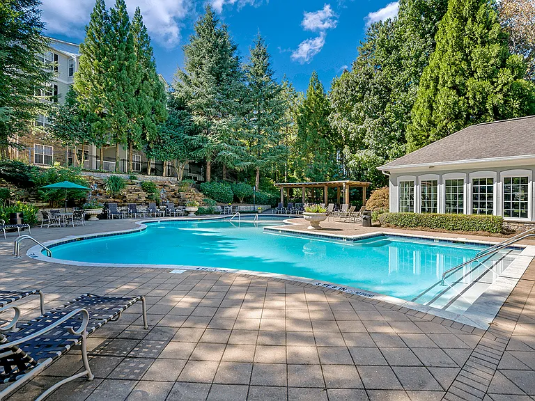 Lounge in luxury by our exclusive apartment pool