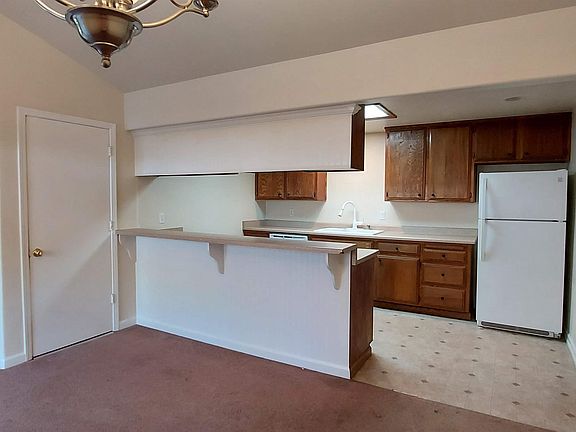 View of kitchen from dining room